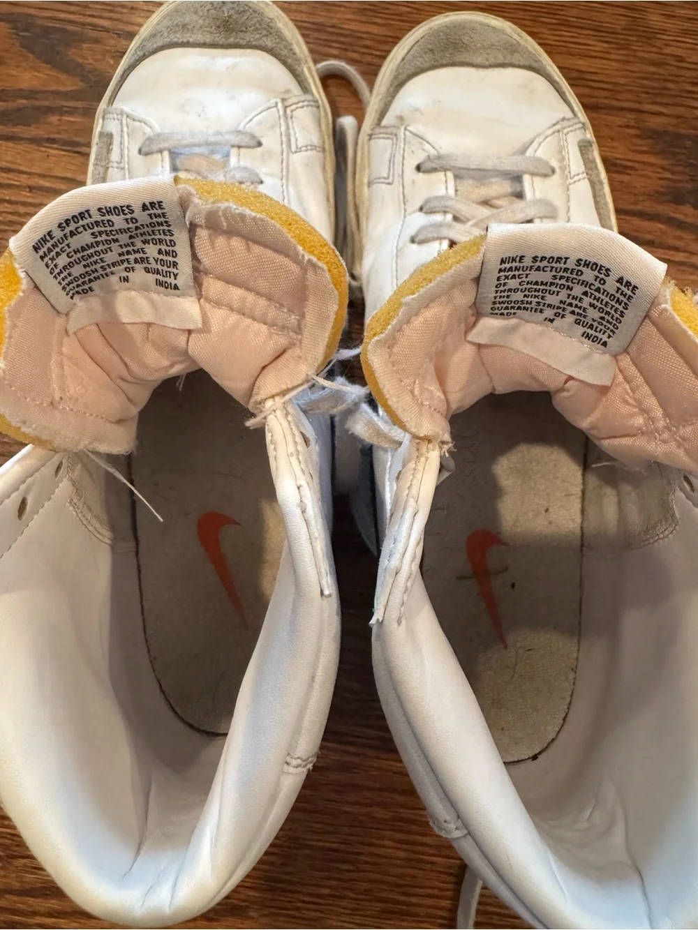 Nike Blazer White High-Top Sneakers with Black Swoosh Woman 11